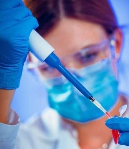 DNA lab Female scientist testing DNA in lab